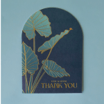 Navy thank-you card with gold-outlined tropical leaves