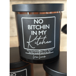Black soy candle jar with a bold profanity label