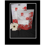 Two Silk Road tea pouches with a white daisy and small pink flowers