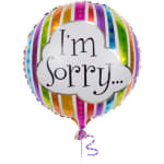 Rainbow foil balloon with the words "I'm Sorry..."