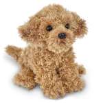 Plush tan puppy toy with curly fur and black eyes