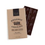 Organic dark chocolate bar partly wrapped in a kraft paper sleeve with printed text