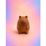 Chocolate bear-shaped candy on a pastel gradient background