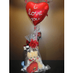 Red heart balloon above a wrapped teddy bear gift