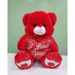 Red teddy bear holding a heart that says "I Love You"