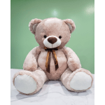 Large beige teddy bear with a brown ribbon bow