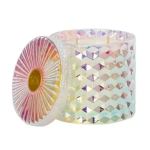 Iridescent decorative candle in a faceted glass jar
