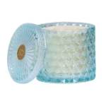 Blue glass candle jar with a matching lid