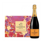 Godiva chocolate box beside a Veuve Clicquot champagne bottle