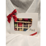 Box of assorted chocolates with a red ribbon