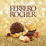 Ferrero Rocher chocolates on a gold background