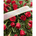 Red roses with a "Loving Father" ribbon