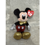 Plush Mickey Mouse toy with a red Ty heart tag and gold glitter shoes