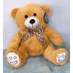 Plush teddy bear with a patterned bow tie