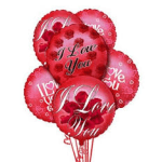 Cluster of red heart-shaped balloons with love messages