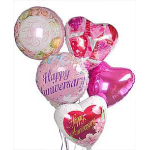 Cluster of heart-shaped and round anniversary balloons in pink and white