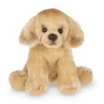 Plush tan puppy sitting on a white background