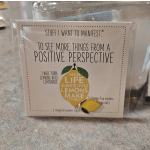 A greeting card with a lemon illustration and motivational text