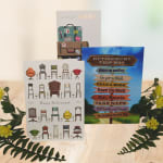 Retirement greeting cards displayed with yellow flowers and greenery