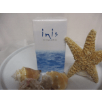 Cologne spray box with seashells and a starfish on a tray
