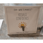 A small card in a clear holder with a tiny decorative charm attached.