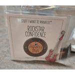 Gift card with a pink guitar charm in a clear sleeve