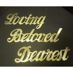 Gold script words reading Loving, Beloved, and Dearest on a black background