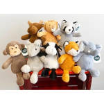 Assorted plush animal toys arranged on a red bench