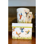 Hummingbird-patterned mug on a matching gift box