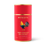 Red tea tin with a rooster illustration