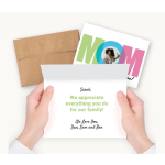 Hands holding a Mother’s Day card with an envelope and note