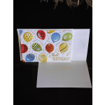 Birthday greeting card with colorful balloons and confetti