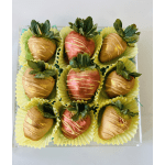 Box of chocolate-covered strawberries in yellow paper cups