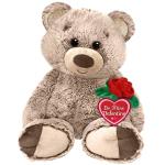 Plush teddy bear holding a red rose and Valentine heart tag
