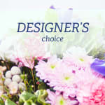 Designer’s choice floral arrangement with pink and purple blooms