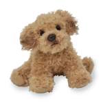 Small tan plush dog sitting on a white background
