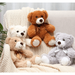 Four plush teddy bears sitting on a knitted blanket