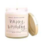 Birthday candle in a glass jar with a gold lid