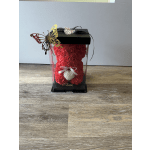 Red rose arrangement in a black gift box with a butterfly decoration