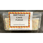 Plastic container of birthday cake fudge squares with colorful sprinkles and a printed label on top