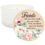 White three-wick candle with a floral friendship label