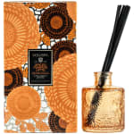 Pumpkin spice reed diffuser with orange patterned box and amber glass bottle