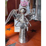 Silver angel figurine with a ribbon bow on a wooden surface
