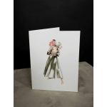 Greeting card with a watercolor figure holding flowers
