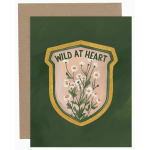 Greeting card with a floral shield design and the words Wild at Heart