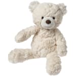 Cream teddy bear plush toy sitting on a white background