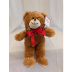 Brown teddy bear with a red bow and hanging gift tag