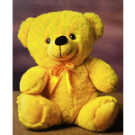 Yellow teddy bear with a satin bow sitting against a dark background