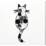 Black and white quilled cat wall art on a white background