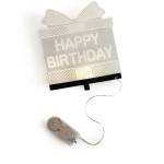 Birthday card with a string light attached